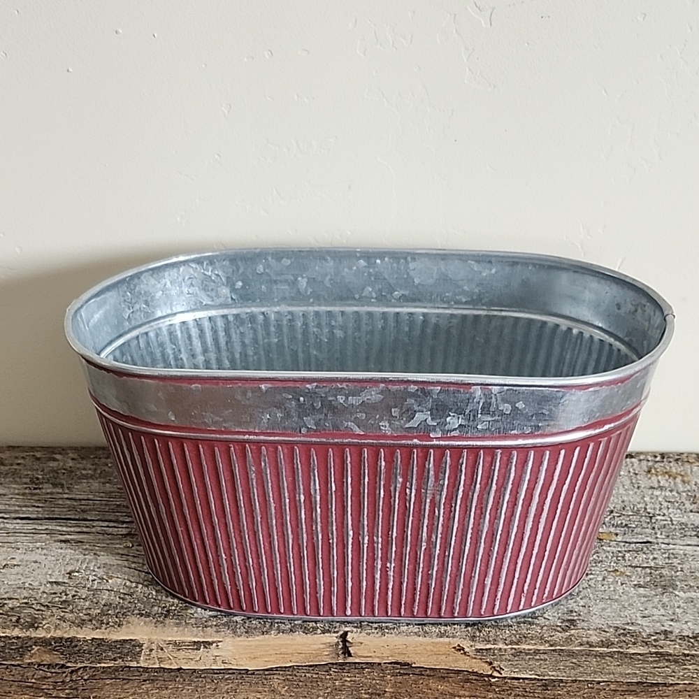 Red and Silver Metal Container